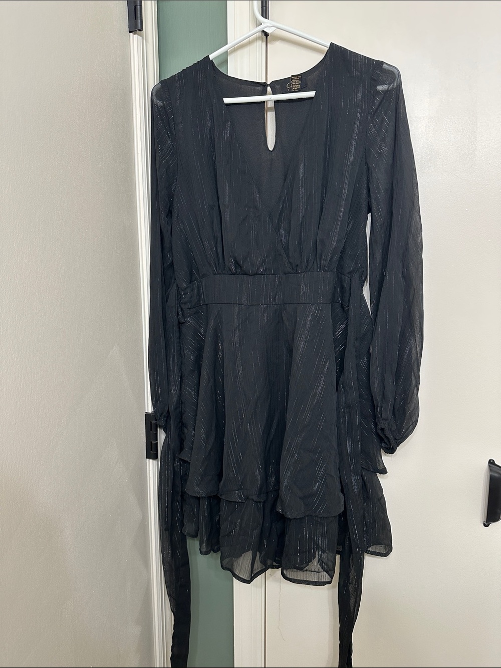 Black Long-Sleeve V-Neck Tiered Mini Dress with Subtle Metallic Stripe